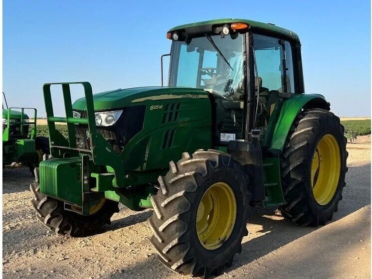 2015 John Deere 6125M inspected unit